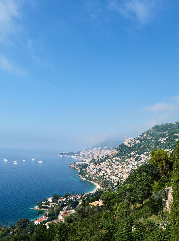 View from Maybourne Riviera, mountainous, greenery, houses, blue skies, sea and boats